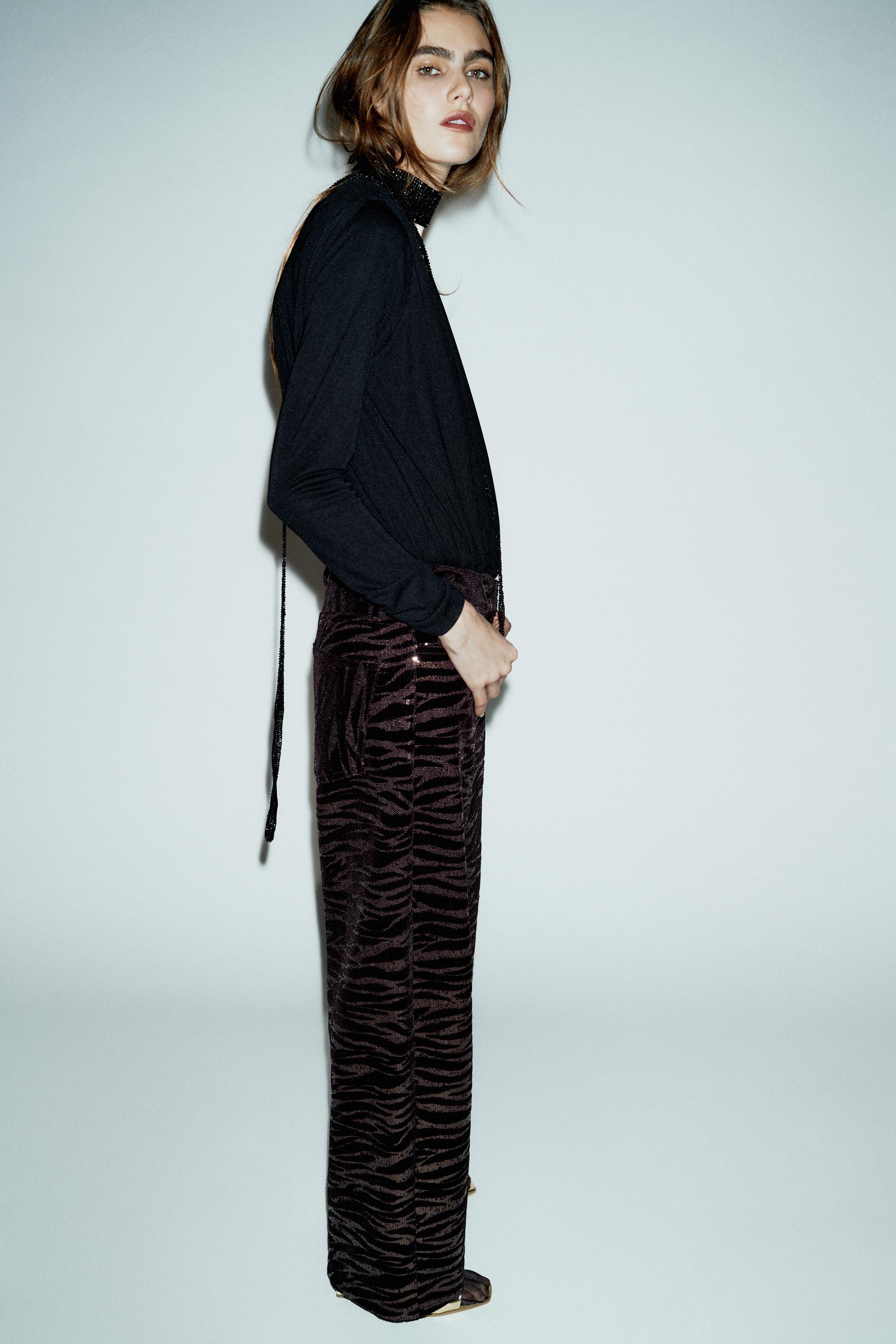 DRAPED CHAIN BODYSUIT